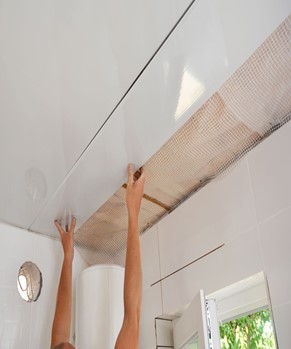 Image: Ceiling tile installation.