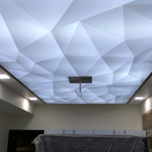 Image: A geometric stretch ceiling design in an office.